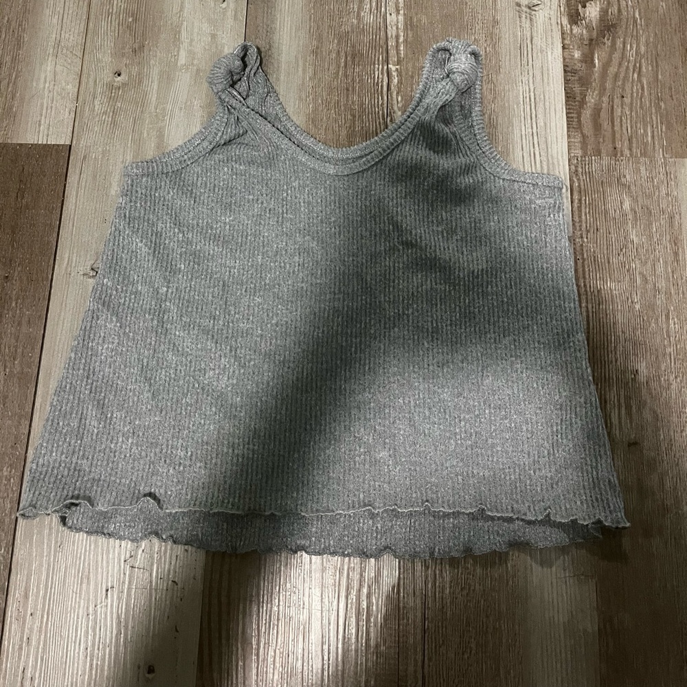 This is a grey tank top from Walmart and is in a size small. It is listed for $3